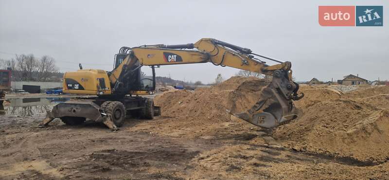Колісний екскаватор Caterpillar 316
