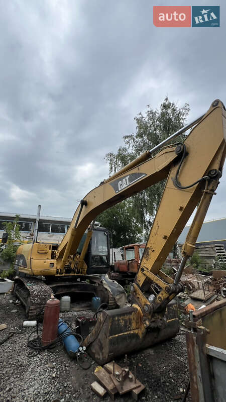 Гусеничний екскаватор Caterpillar 322