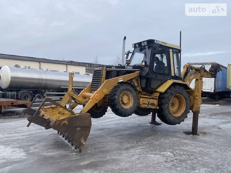 Экскаватор погрузчик Caterpillar 428