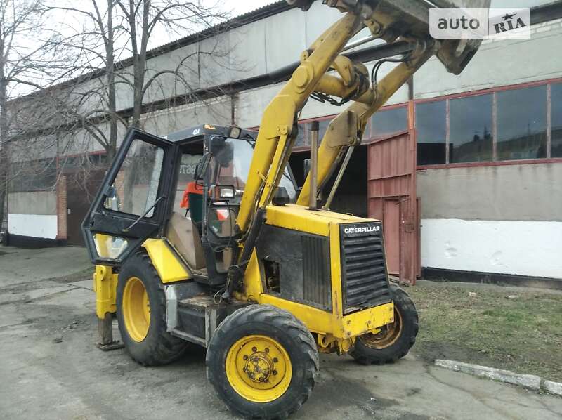 Екскаватор навантажувач Caterpillar 428