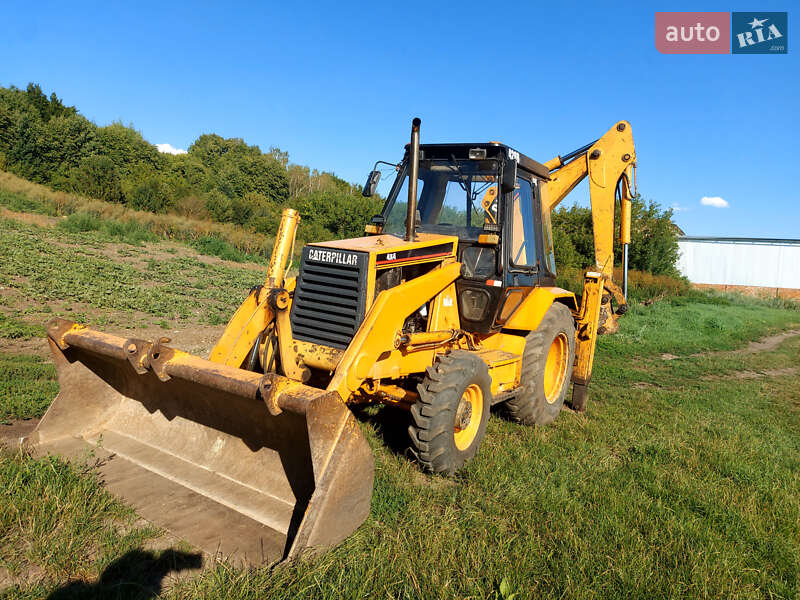 Екскаватор навантажувач Caterpillar 428