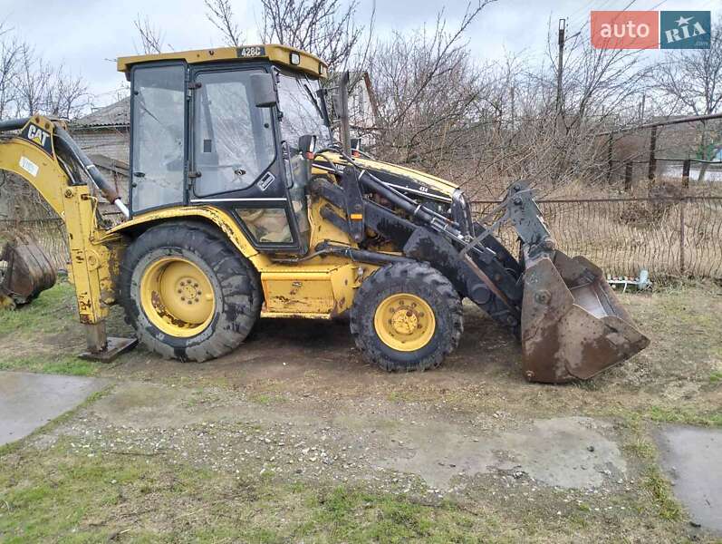 Колісний екскаватор Caterpillar 428