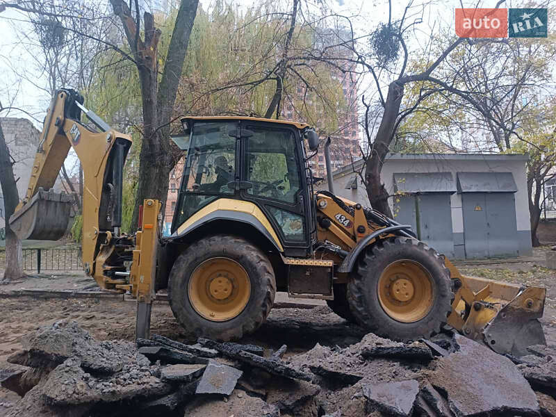 Екскаватор навантажувач Caterpillar 434