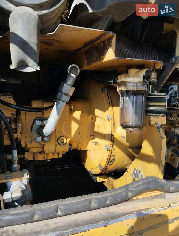 Екскаватор навантажувач Caterpillar M312
