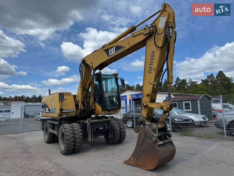 Caterpillar M313