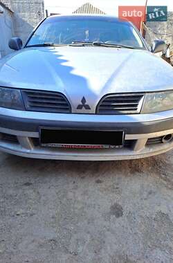Ціни Mitsubishi Carisma Газ пропан-бутан / Бензин