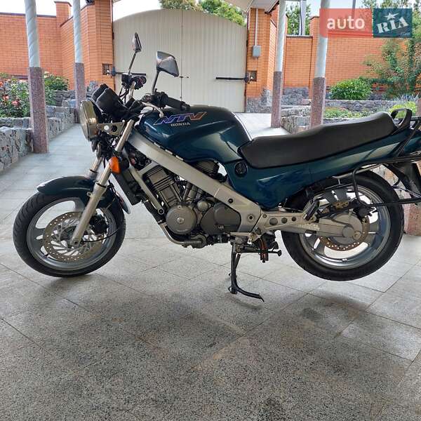 Мотоцикл Без обтекателей (Naked bike) Honda NT 650V Deauville