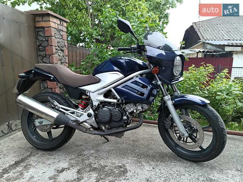Мотоцикл Без обтекателей (Naked bike) Honda VTR 250