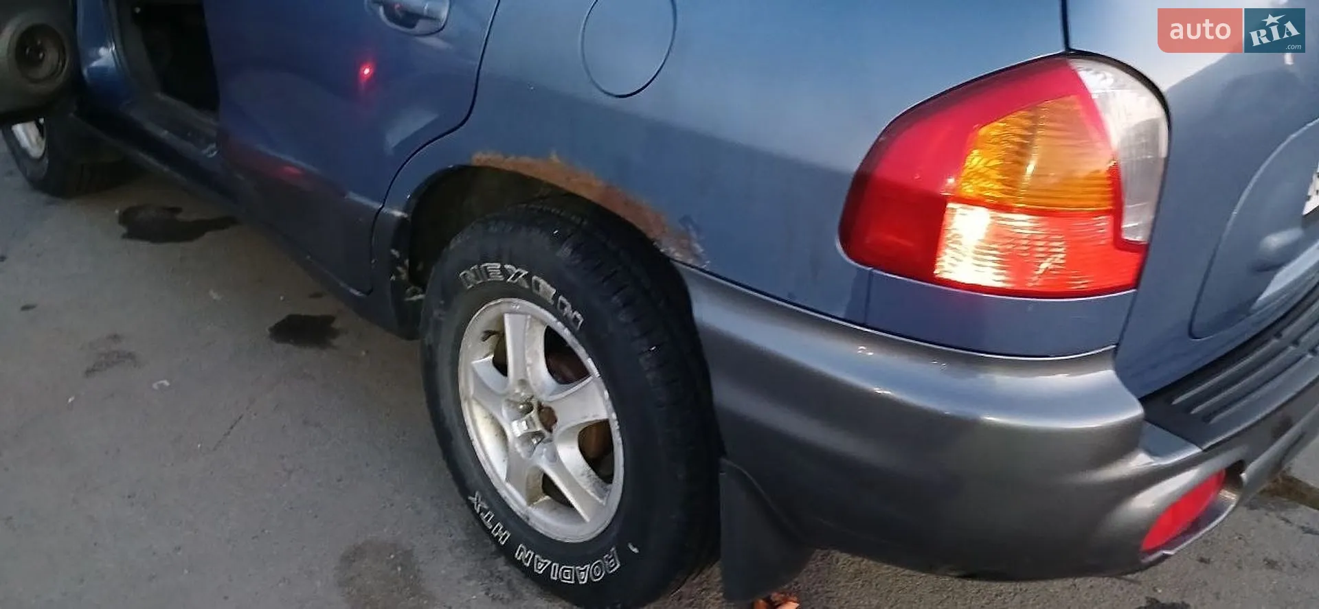 Hyundai Santa FE 2002 VIN KMHSC81DP2U347379 фото оголошення 8 з 16