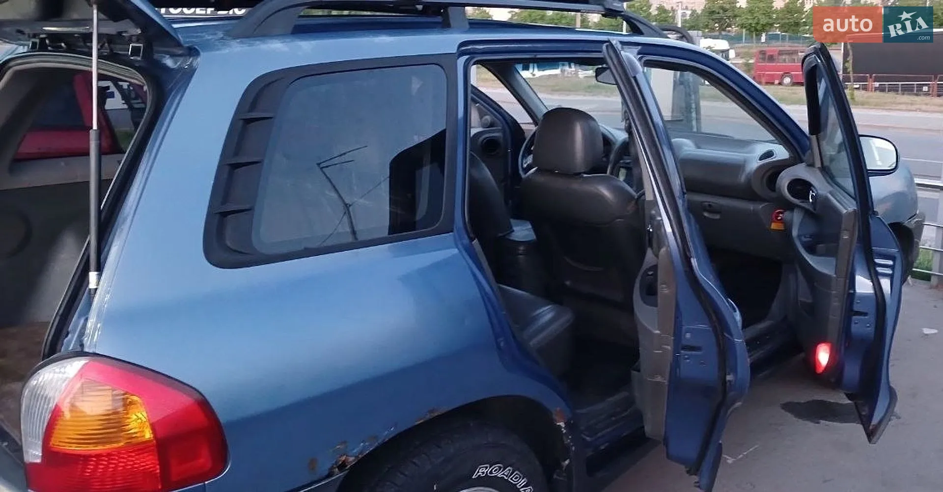 Hyundai Santa FE 2002 VIN KMHSC81DP2U347379 фото оголошення 12 з 16