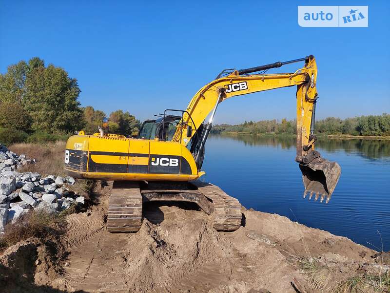 Экскаватор погрузчик JCB 220