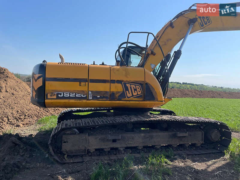 Экскаватор погрузчик JCB 220