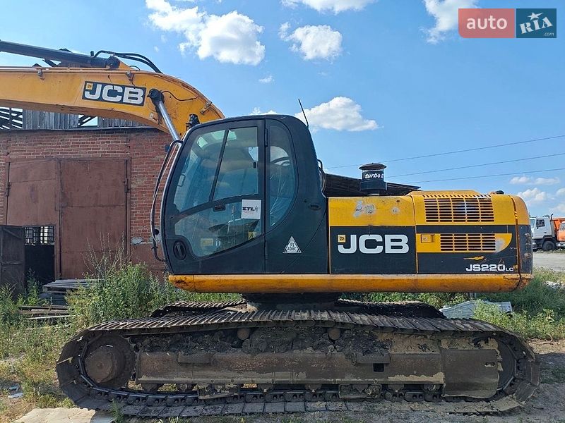 Экскаватор погрузчик JCB 220