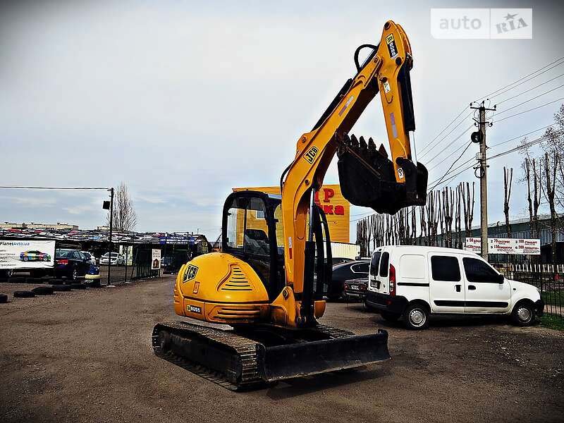 Екскаватор навантажувач JCB 8055