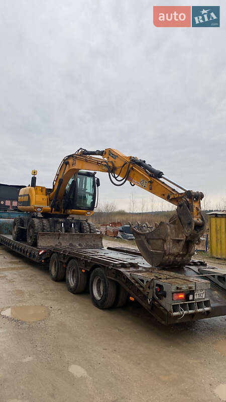Колесный экскаватор JCB JS 130