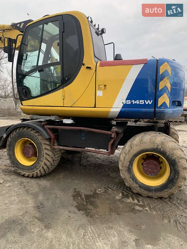 Екскаватор навантажувач JCB JS 145