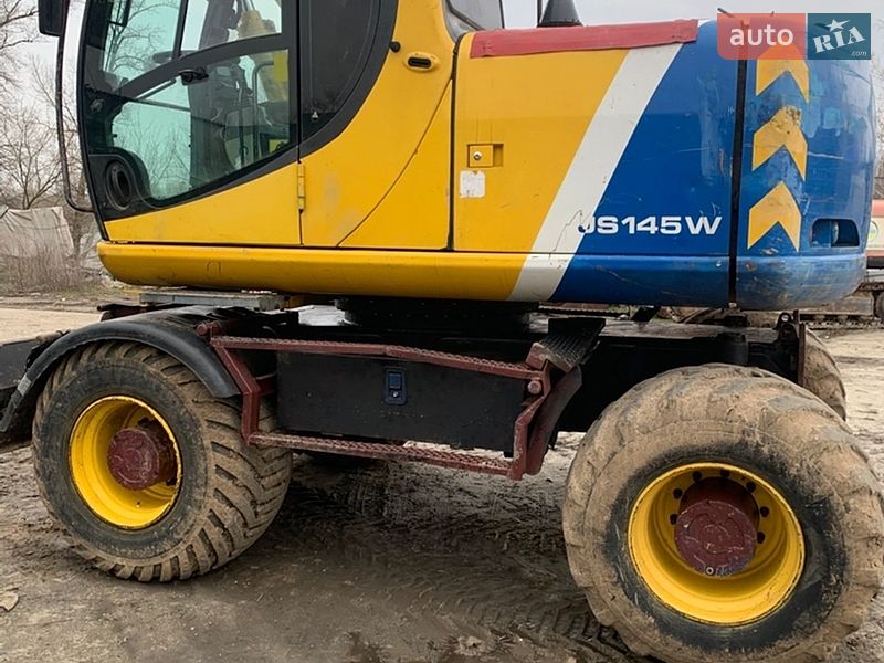 Екскаватор навантажувач JCB JS 145