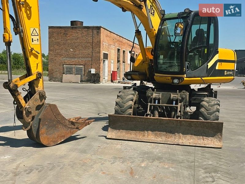 Колісний екскаватор JCB JS 145