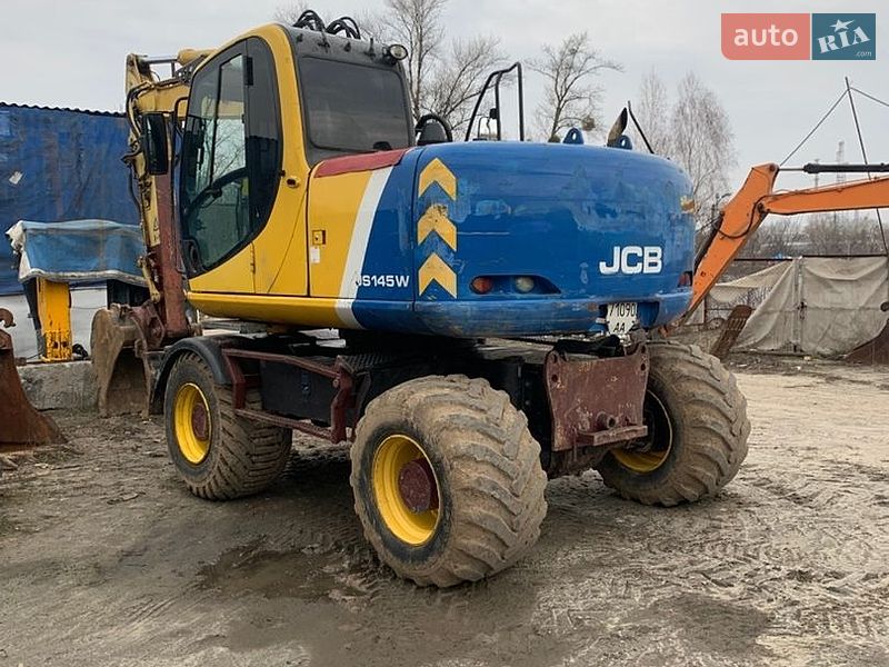 Екскаватор навантажувач JCB JS 145