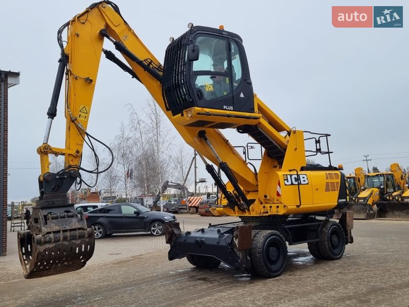 Экскаватор погрузчик JCB JS 200