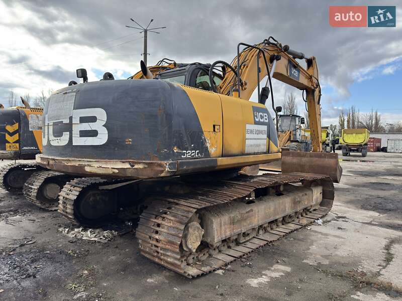 Экскаватор погрузчик JCB JS 220LC