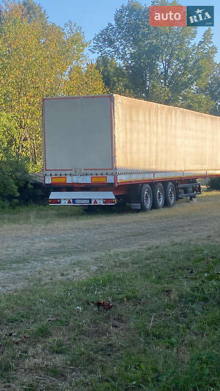 Бортовой полуприцеп Kogel SNCM