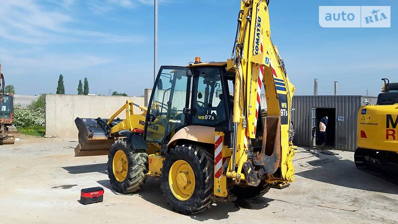 Экскаватор погрузчик Komatsu WB