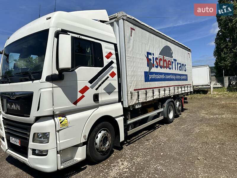 Тентований борт (штора) - прицеп Krone BDF