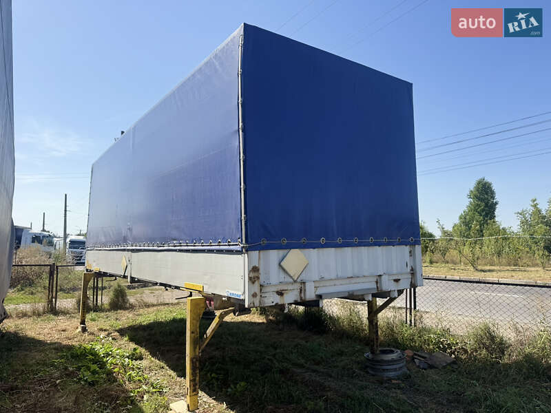 Тентований борт (штора) - прицеп Krone BDF