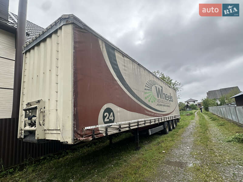 Тентований борт (штора) - прицеп Krone Mega