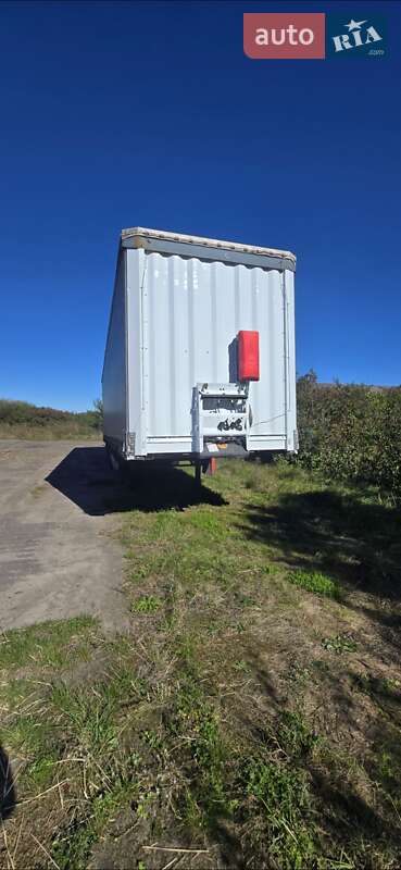 Тентований борт (штора) - напівпричіп Krone Profi Liner