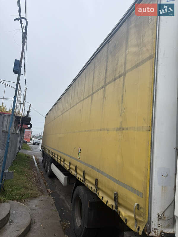 Тентований борт (штора) - прицеп Krone Profi Liner