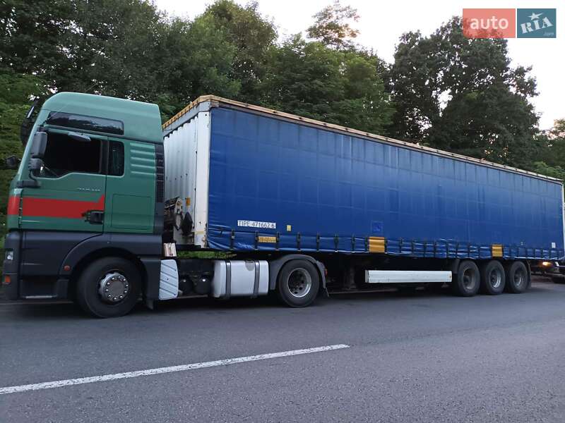 Тентованный борт (штора) - полуприцеп Krone SD