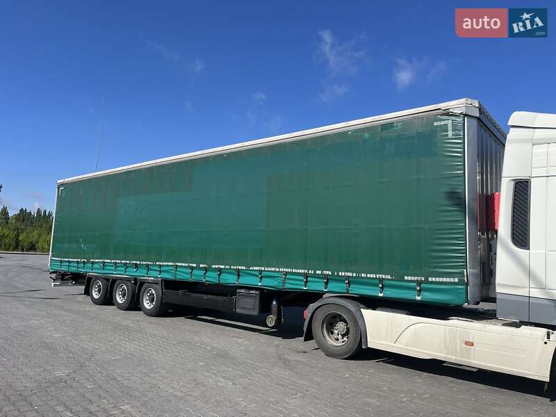 Тентований борт (штора) - напівпричіп Krone SD