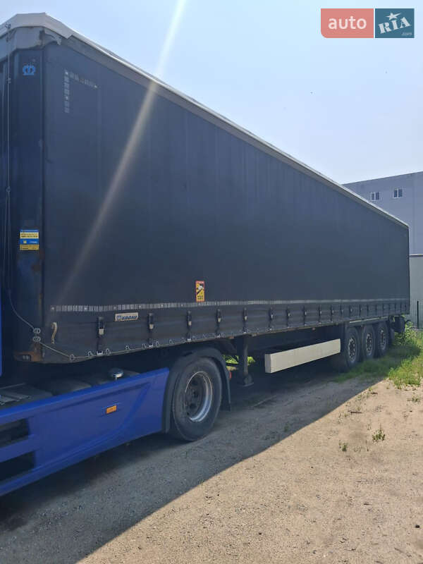 Тентований борт (штора) - прицеп Krone SD