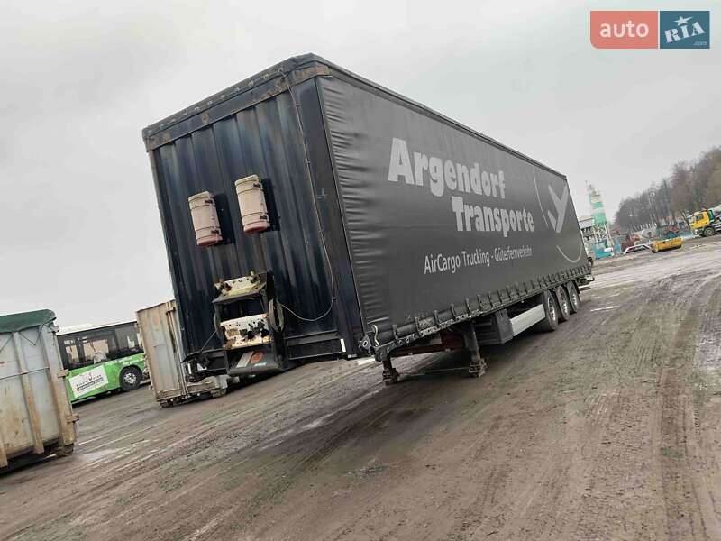 Тентований борт (штора) - прицеп Krone SD