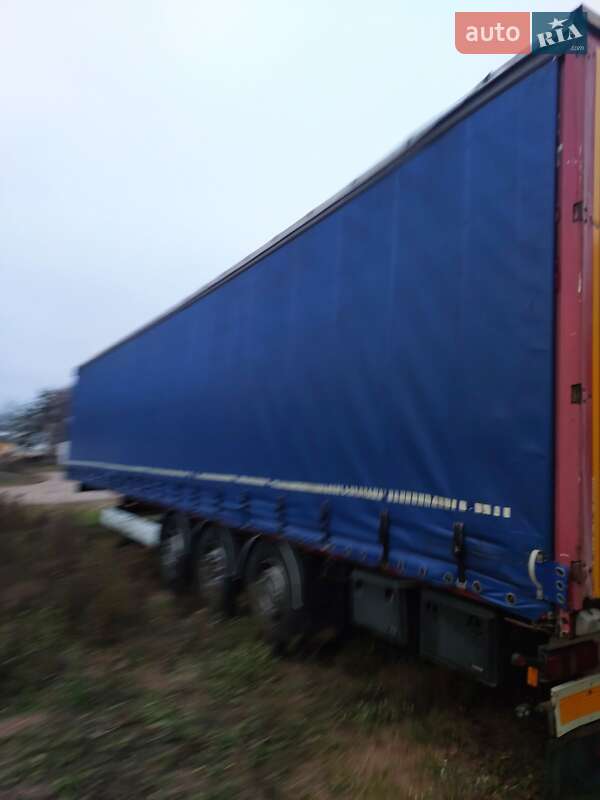 Тентований борт (штора) - напівпричіп Krone SDR 27