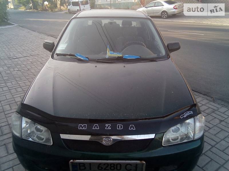 Mazda 323 1999 года