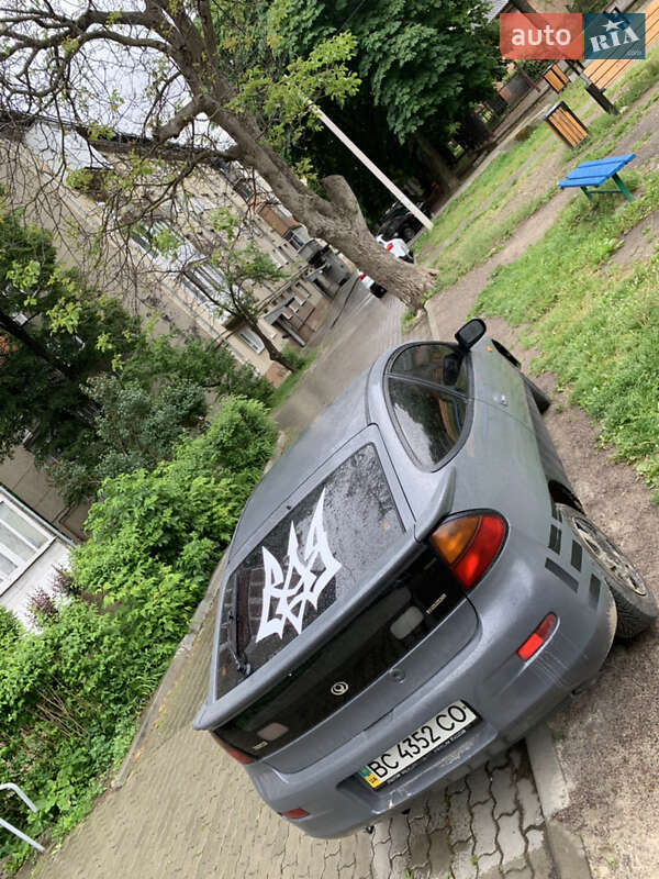 Седан Mazda 323 1996 в Надворной