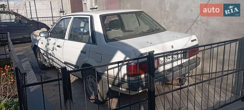 Седан Mazda 323 1987 в Одессе фото 2 Седан Mazda 323 1987 в Одессе