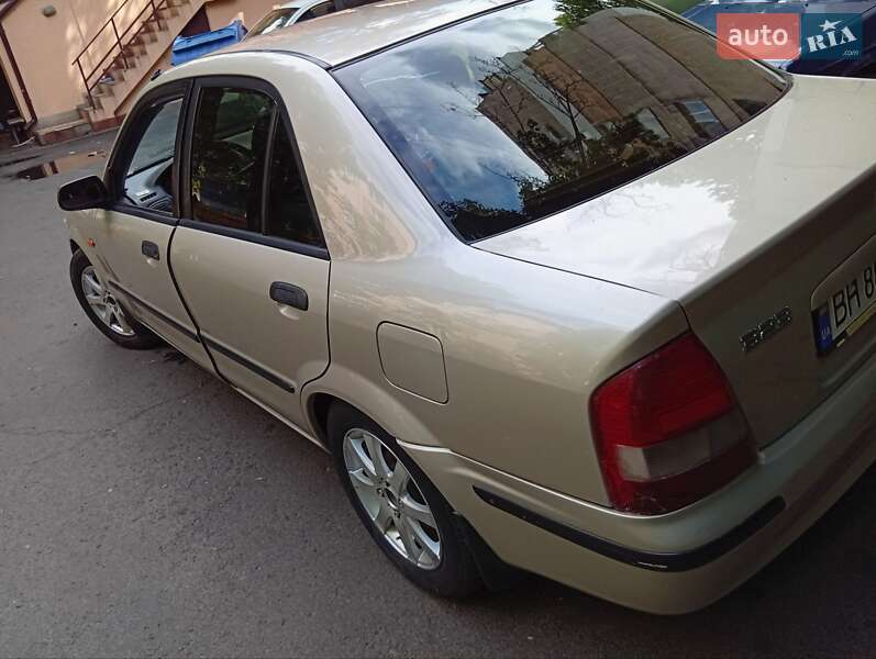 Седан Mazda 323 1999 в Одессе