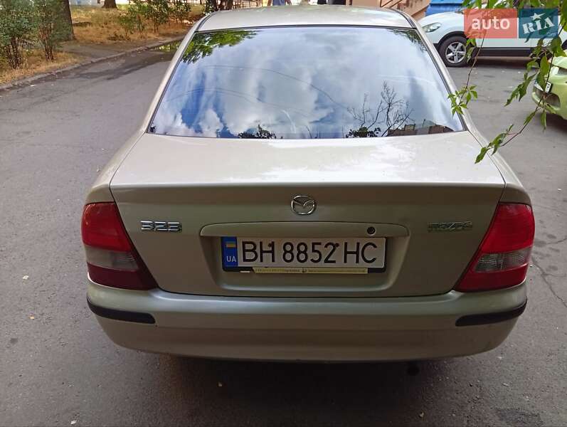 Седан Mazda 323 1999 в Одессе
