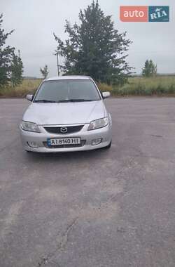 Mazda 323  2002