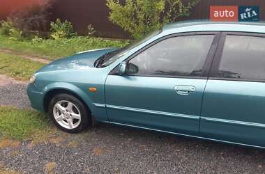 Mazda 323  2003
