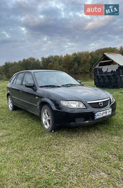 Mazda 323  2003