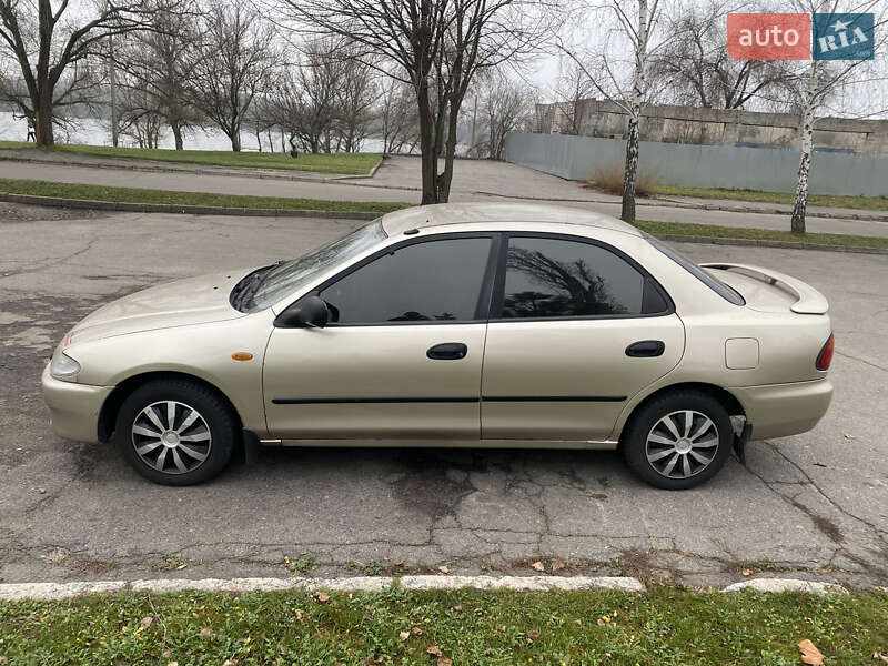 Седан Mazda 323 1996 в Кременчуці