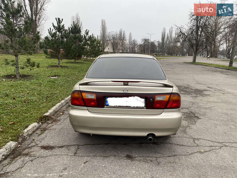 Седан Mazda 323 1996 в Кременчуці