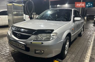 Mazda 323  2002