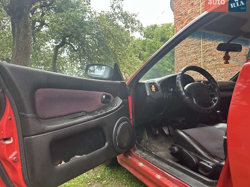 Хэтчбек Mazda 323 1998 в Старом Самборе фото 13 Хэтчбек Mazda 323 1998 в Старом Самборе