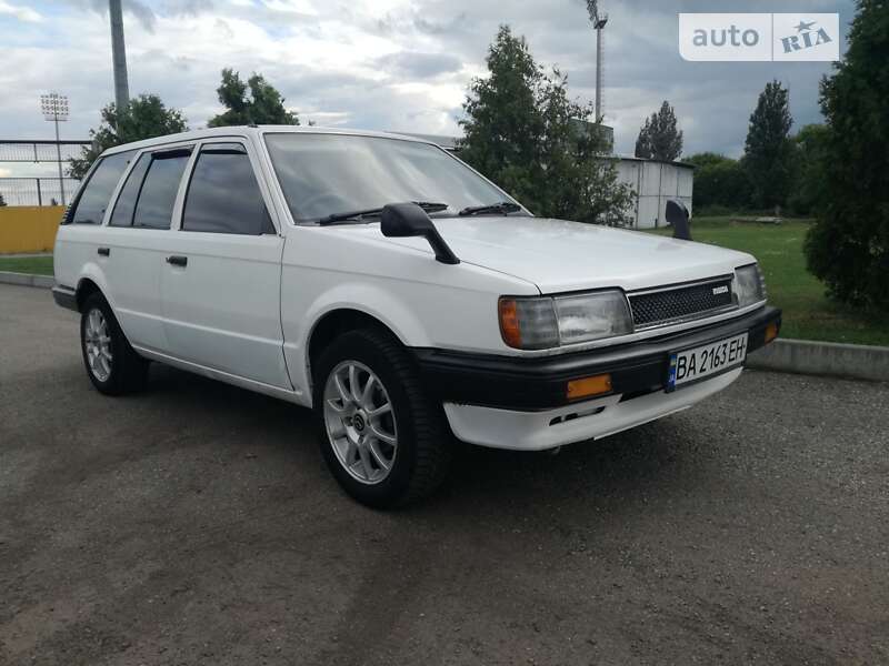 Легковые Mazda Familia